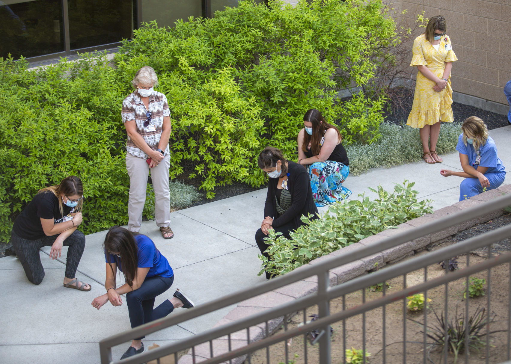Hospital staff show solidarity with moment of silence